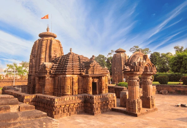 a stone temple with a flag on top